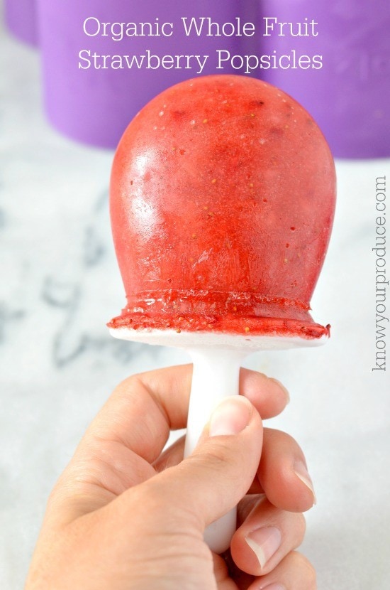 whole fruit and strawberry popsicles in a round ice cream form