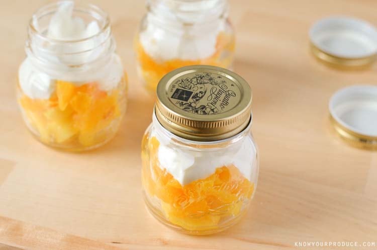 Mason Jar Candy Corn Fruit Cups - Healthy Halloween Treat that is super quick and easy to make. 