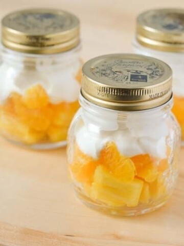 Mason Jar Candy Corn Fruit Cups - Healthy Halloween Treat that is super quick and easy to make.