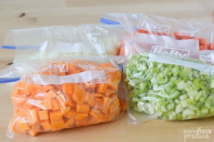 meal prep vegetables in plastic hefty bags on table