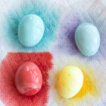 4 eggs naturally dyed with food.