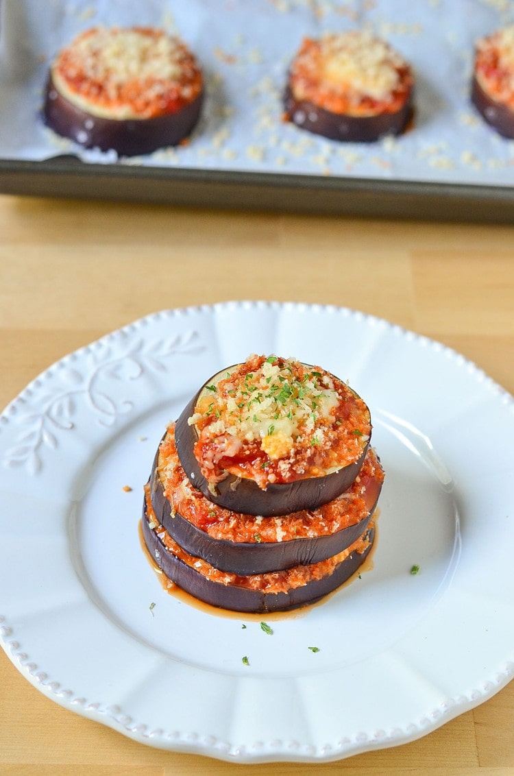 Easy Eggplant Parmesan Recipe using a thick and hearty sauce, cheeses and herbs. This is a simple dinner recipe that you can make in less than 30 minutes! 