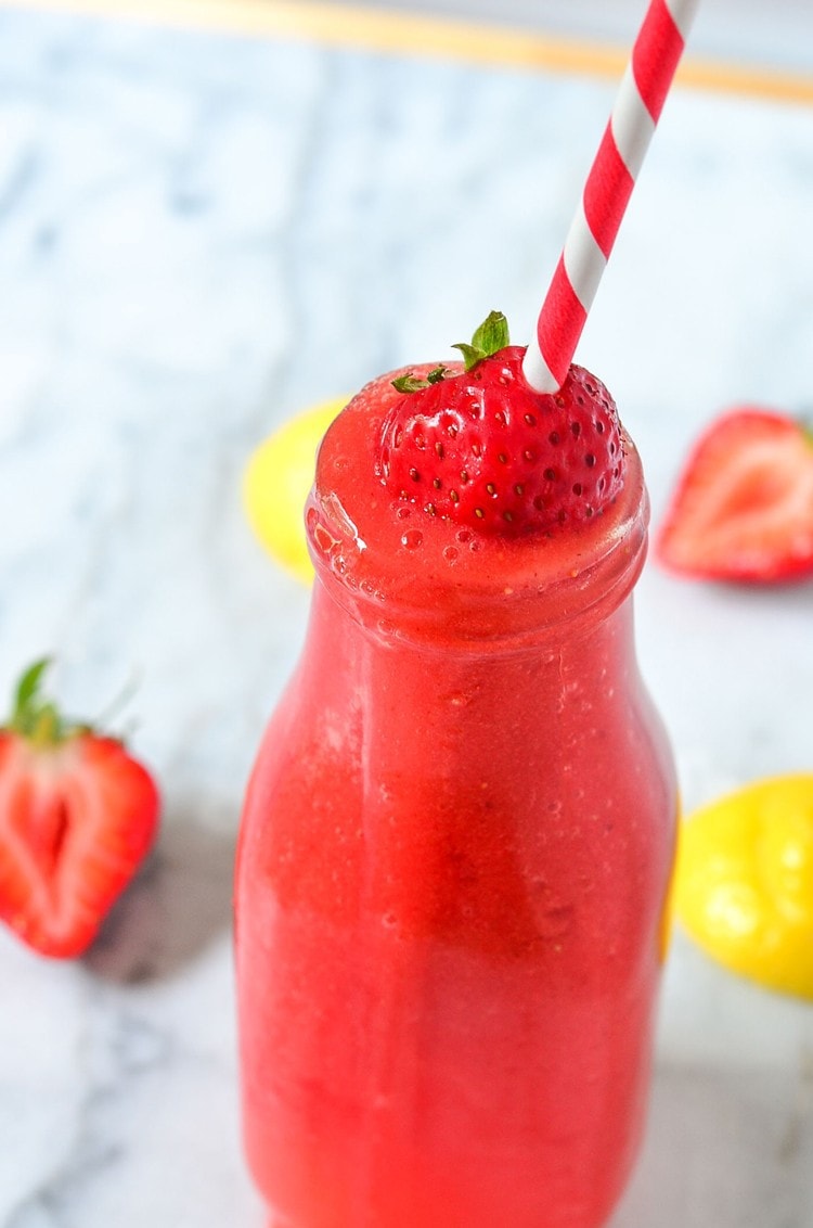 You're going to love our Slushy Strawberry Lemonade Recipe! This is a refreshing summer drink that you can make in just 3 minutes. Using real fruit and ingredients you know.