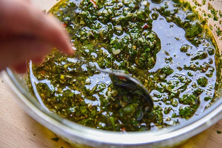 Try our homemade Argentinian Chimichurri Sauce and you'll be putting it on everything! Mixing