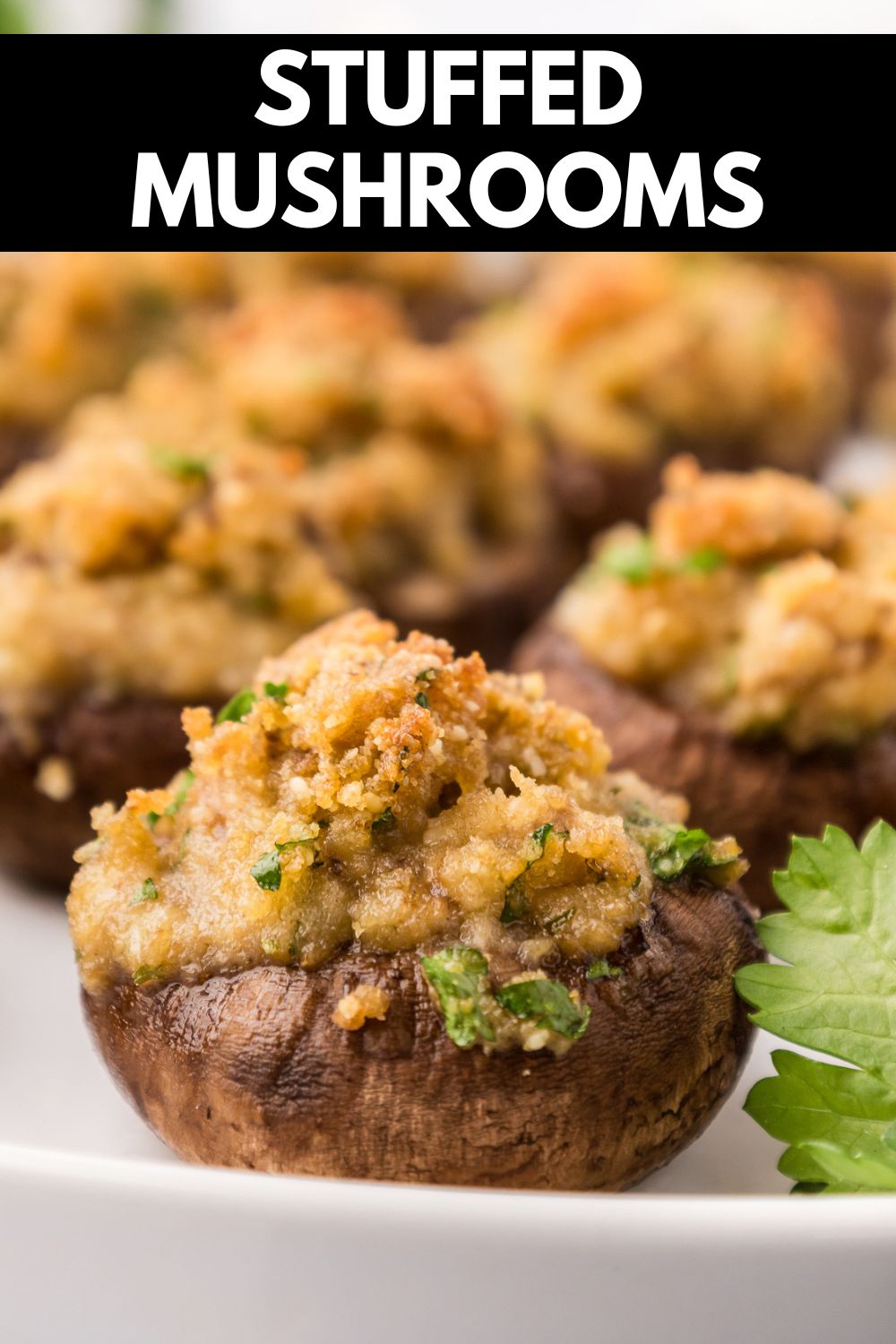 stuffed mushrooms on a white plate pinterest image with text saying stuffed mushrooms.