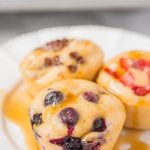 pancake muffins on a plate with maple syrup