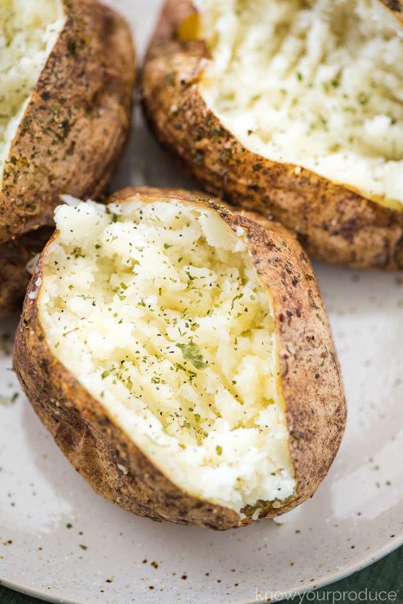 air fryer baked potatoes on a plate