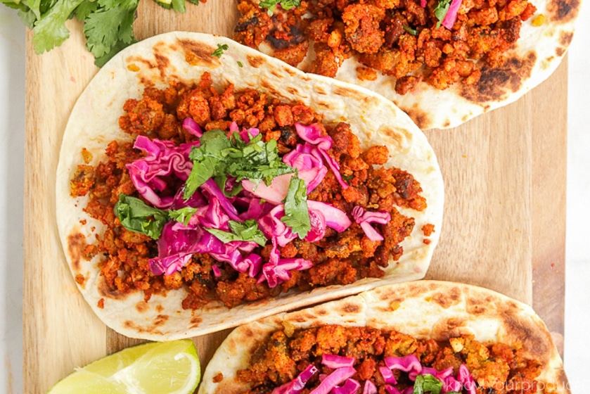 cauliflower tacos with cabbage slaw and parsley garnish