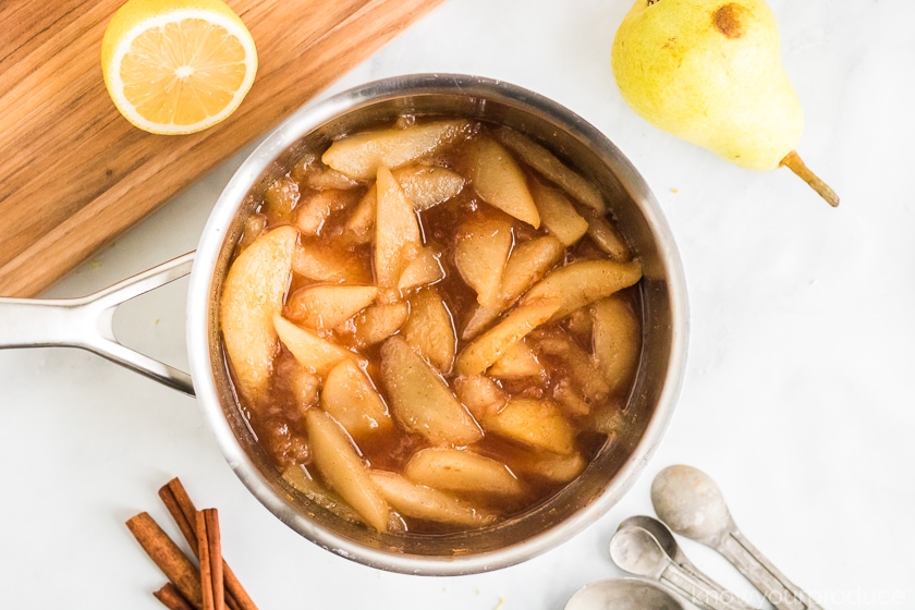 cooked pears in a sauce pan