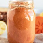 persimmon butter in a glass mason jar