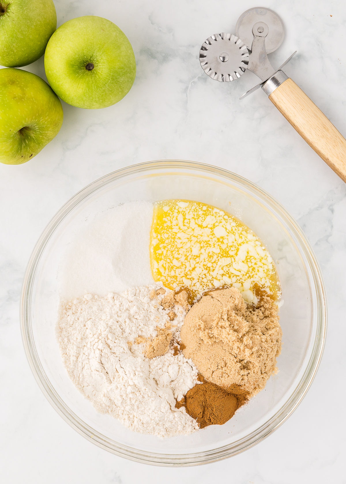 ingredients in a bowl to make pie crumble.