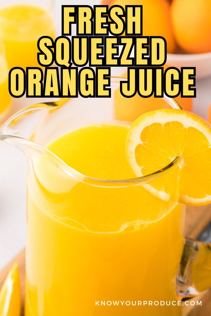 Fresh Squeezed Orange Juice in text on a pitcher of fresh orange juice.