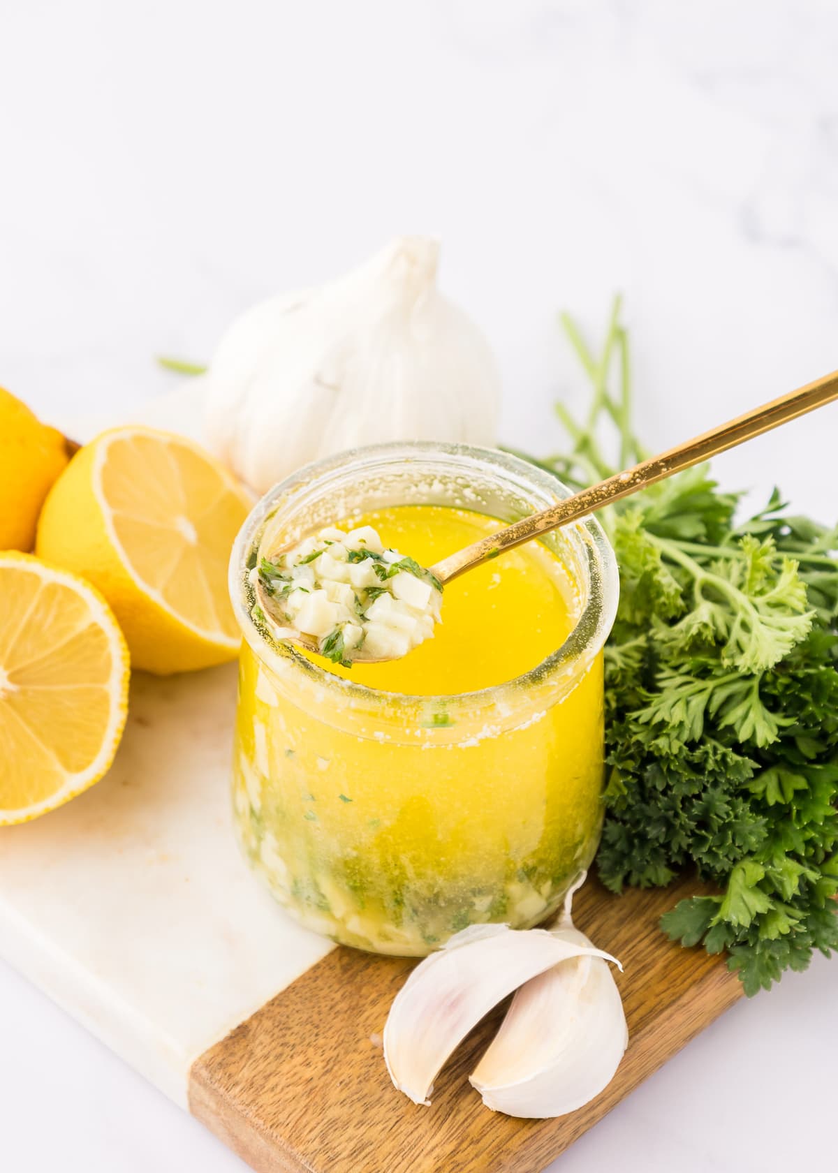 lemon garlic butter sauce recipe in a glass jar.