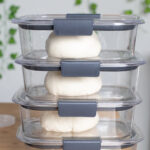 pizza dough in airtight containers stacked ready for the fridge.
