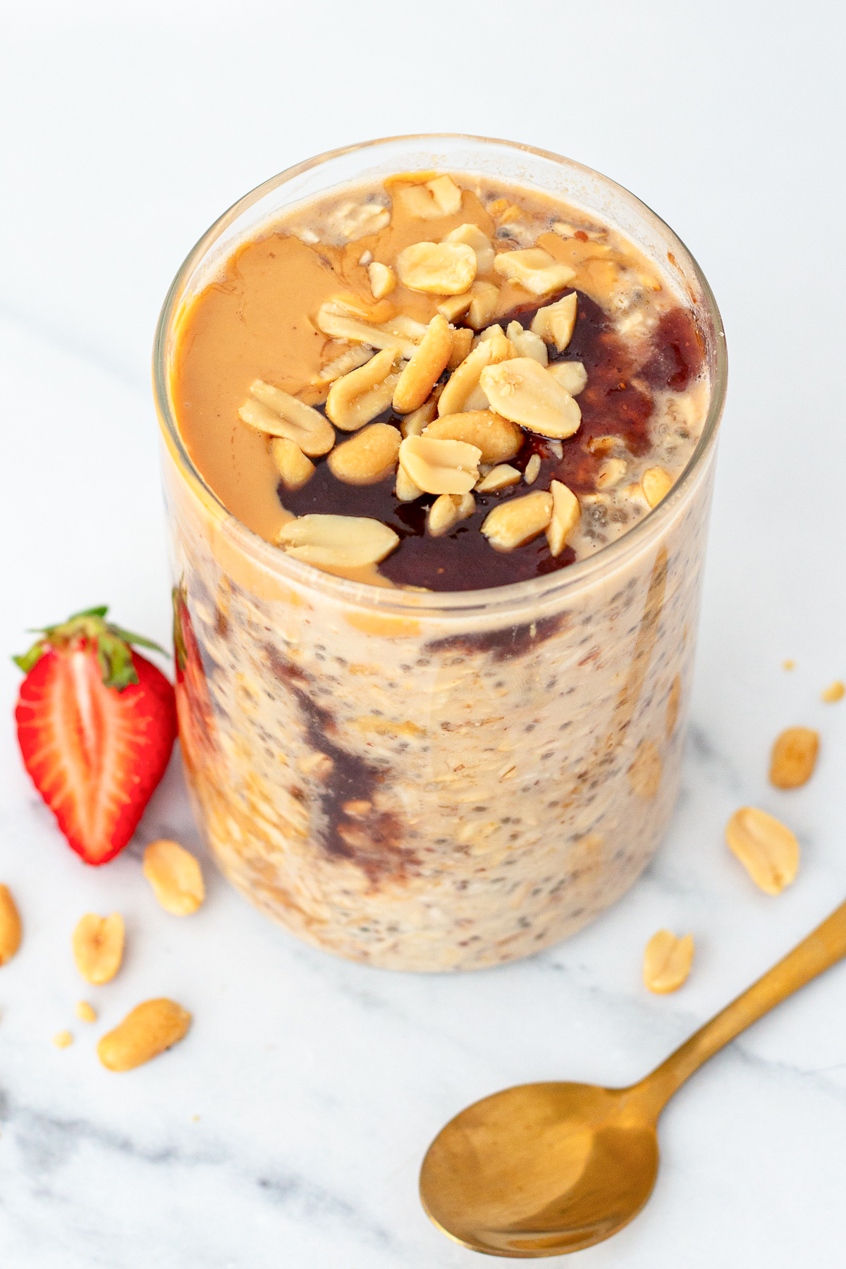 chocolate peanut butter overnight oats in a glass jar.