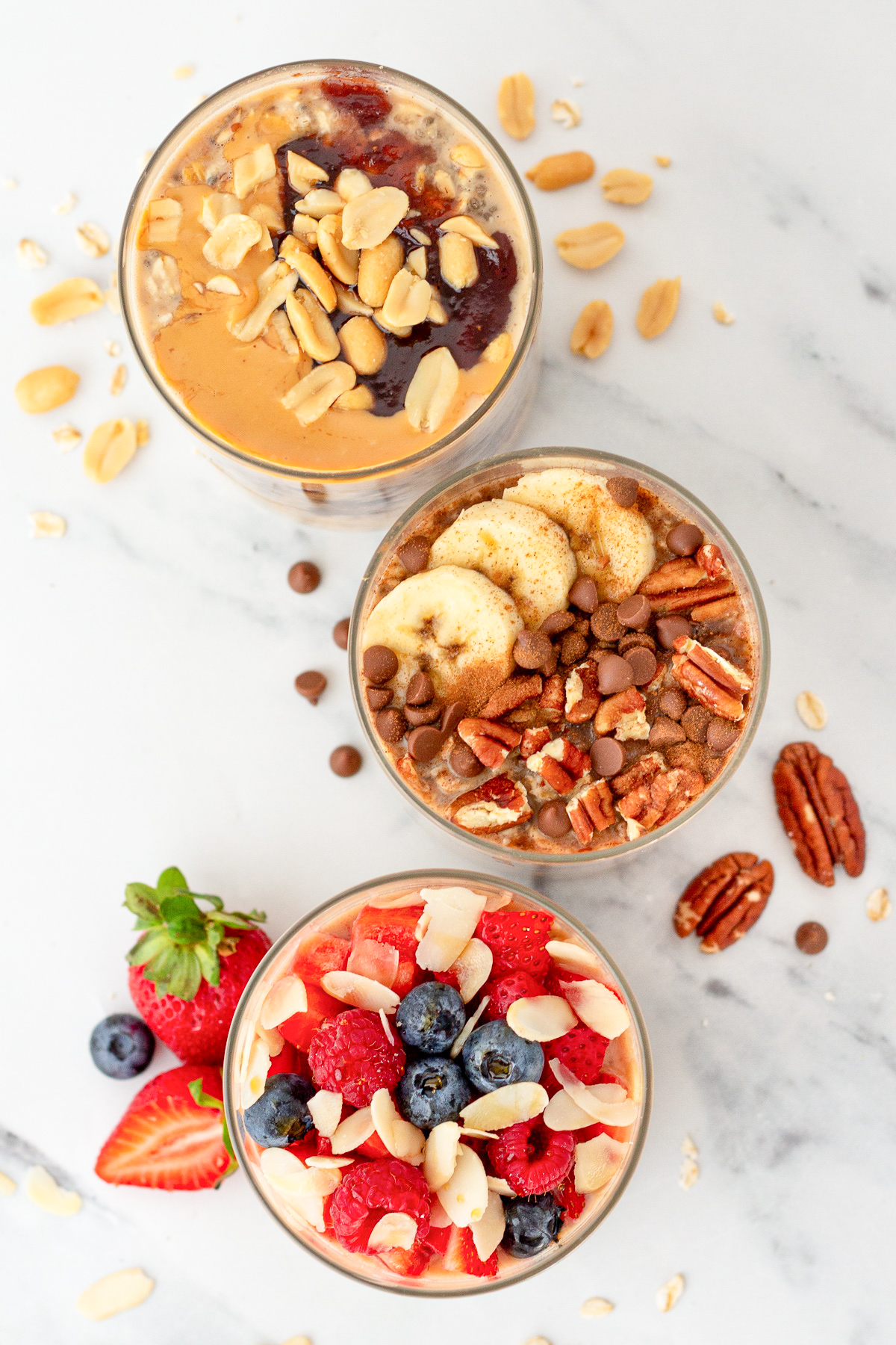 overhead photo of overnight oats in glass jars.
