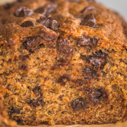 close up showing inside of apple carrot bread with chocolate chips.