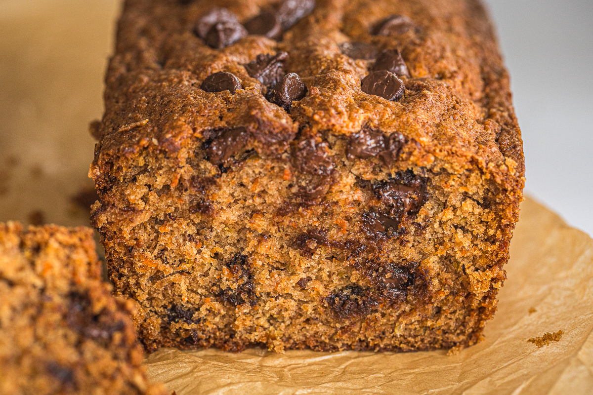apple carrot bread showing inside with chocolate chips.
