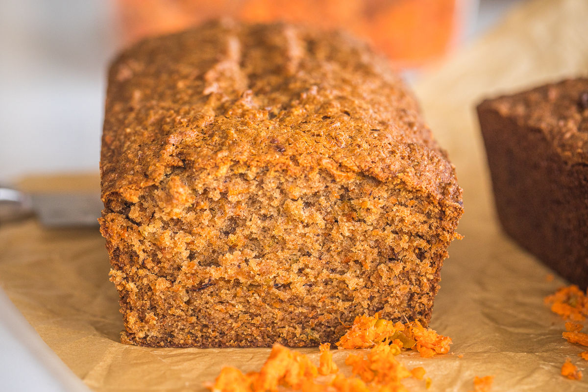 apple carrot bread with juice pulp in front of it.