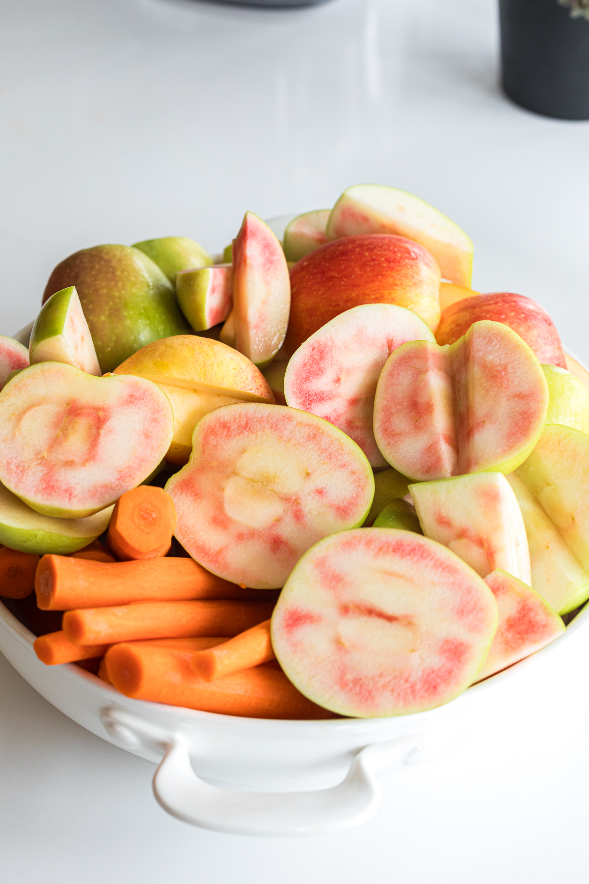 cut up apples and carrots.