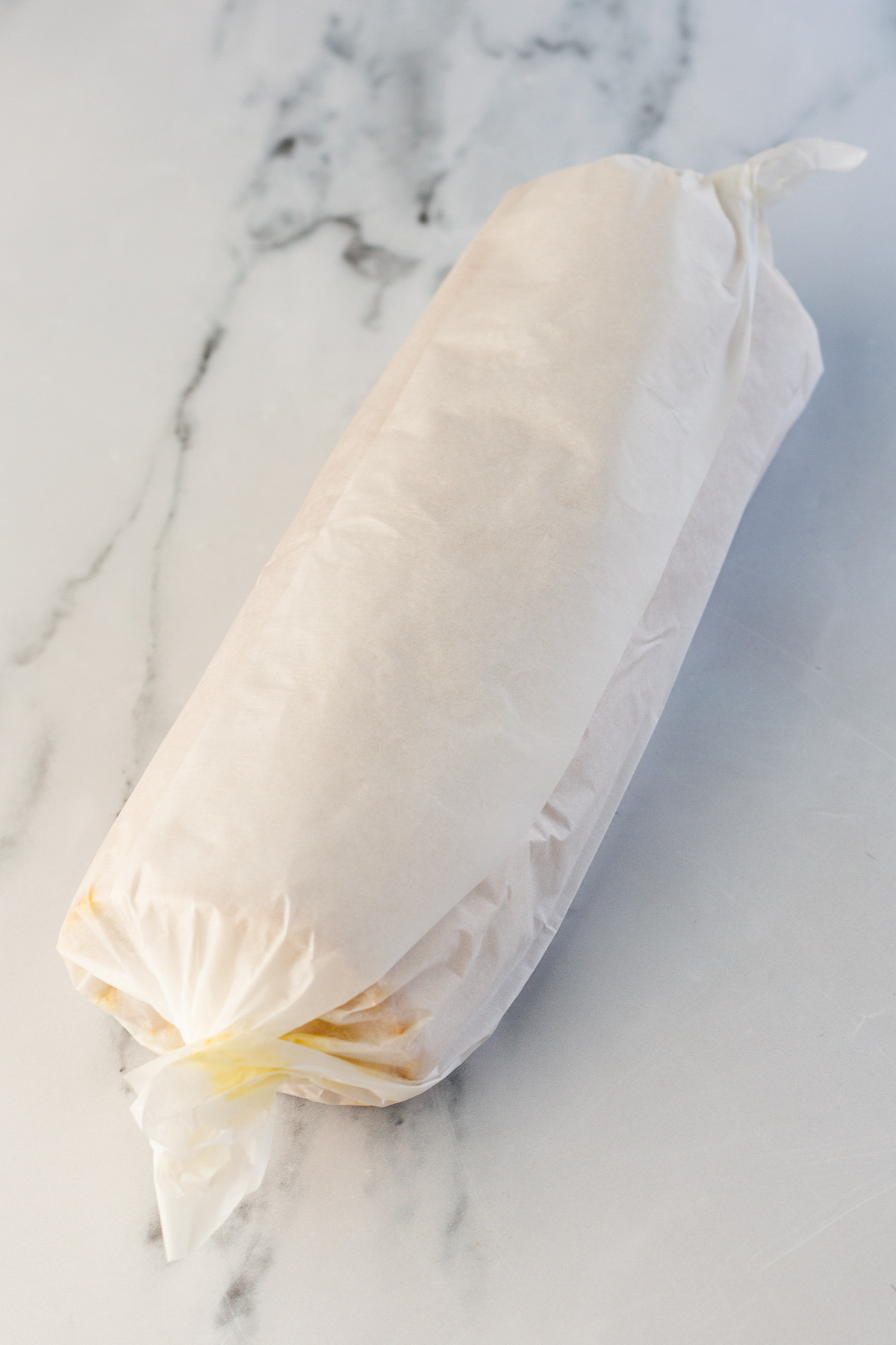 wrapped up pumpkin roll cake.