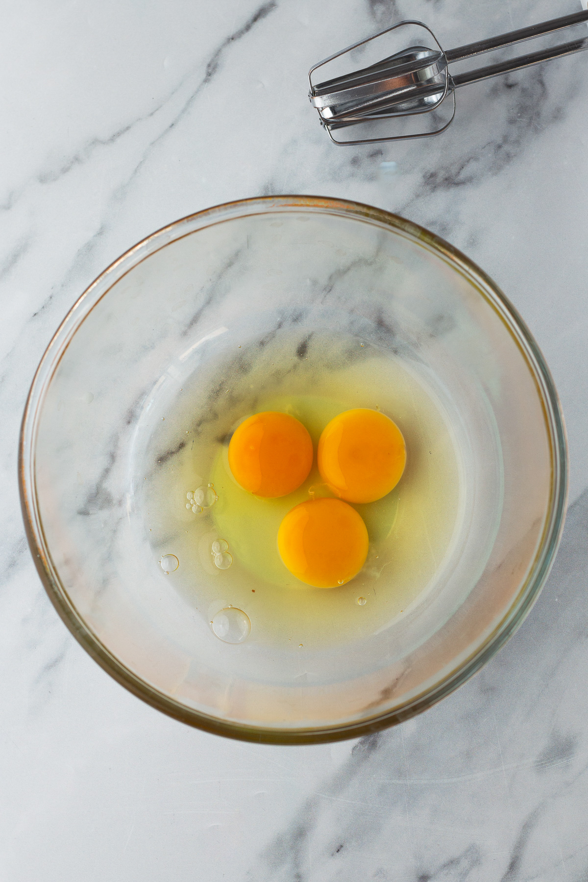 cracked eggs in a bowl.