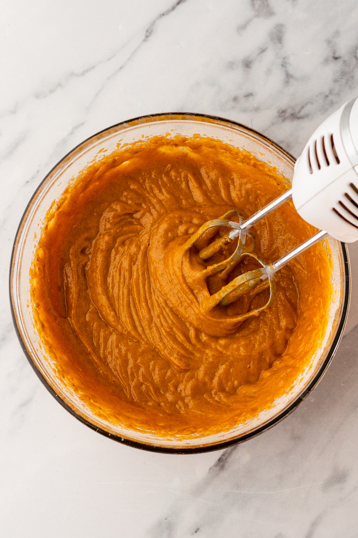 pumpkin roll batter in a bowl.