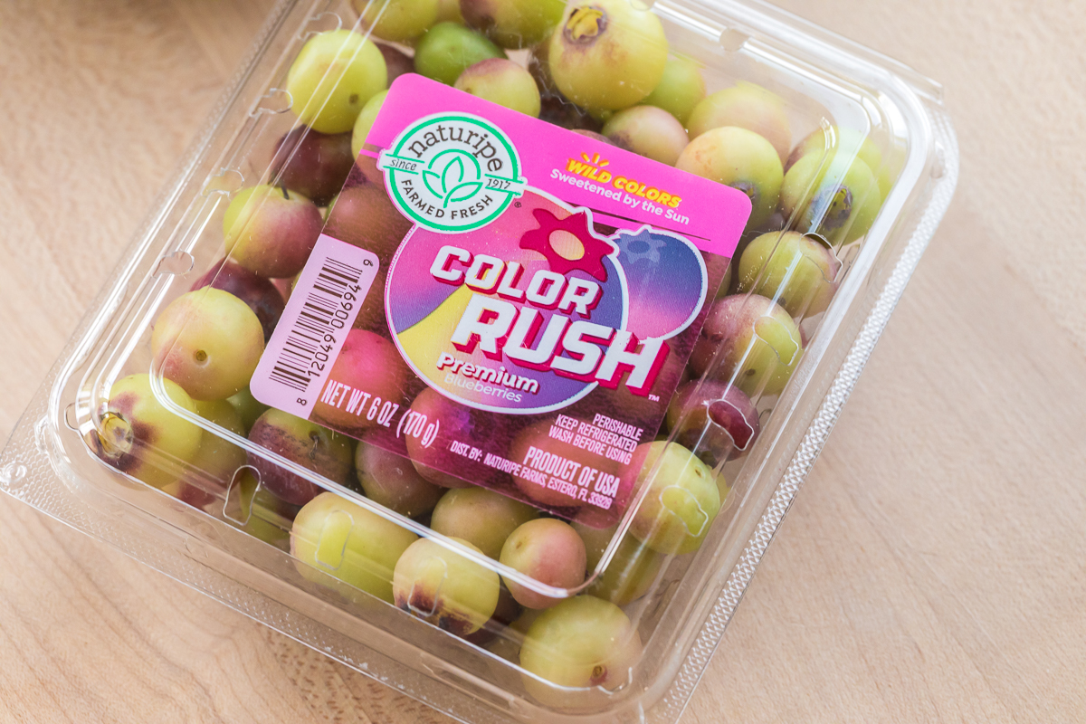 colorful color rush blueberries from nature ripe in package.
